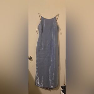 It’s a really pretty vintage dress by McLintock.